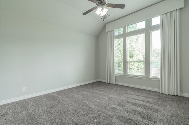 1417 Cordgrass Ct, Edmond, OK 73013 - spare room with carpet, lofted ceiling, a ceiling fan, and baseboards