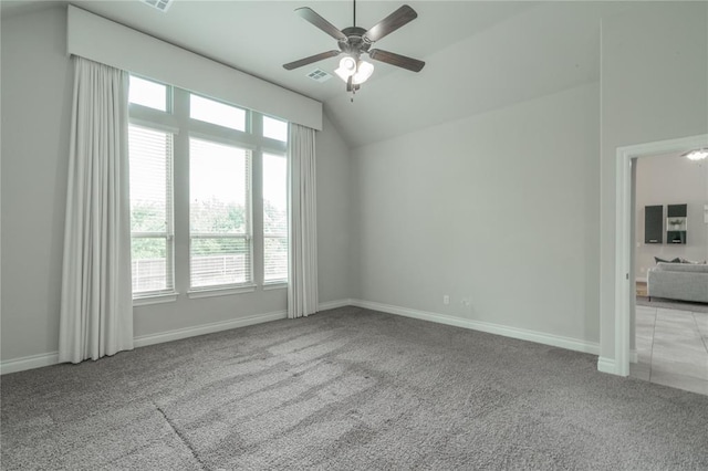 1417 Cordgrass Ct, Edmond, OK 73013 - empty room with carpet floors, a ceiling fan, lofted ceiling, and baseboards
