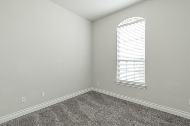 1417 Cordgrass Ct, Edmond, OK 73013 - carpeted spare room featuring baseboards