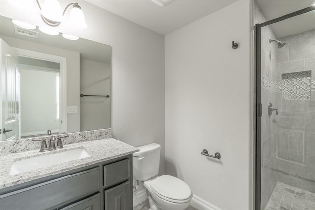 1417 Cordgrass Ct, Edmond, OK 73013 - full bath with vanity, baseboards, toilet, and a stall shower