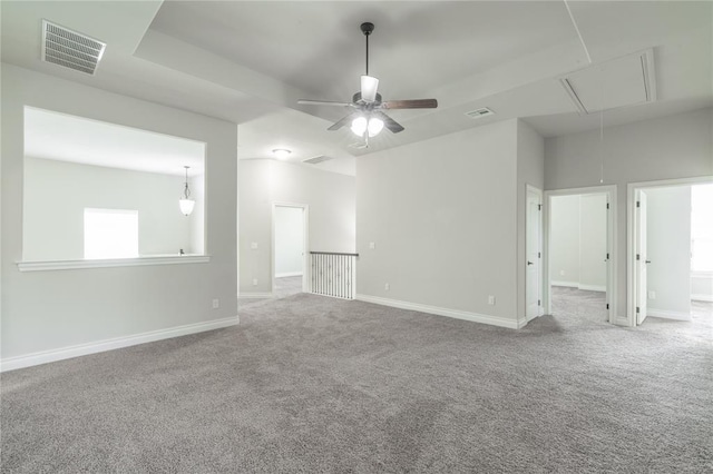 1417 Cordgrass Ct, Edmond, OK 73013 - carpeted empty room with attic access, baseboards, and ceiling fan