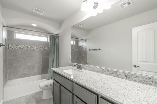 1417 Cordgrass Ct, Edmond, OK 73013 - bathroom featuring toilet, shower / bath combo with shower curtain, vanity, and tile patterned floors