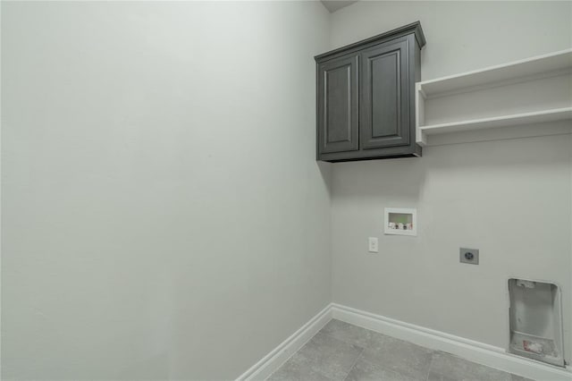 1417 Cordgrass Ct, Edmond, OK 73013 - laundry room with electric dryer hookup, washer hookup, baseboards, and cabinet space