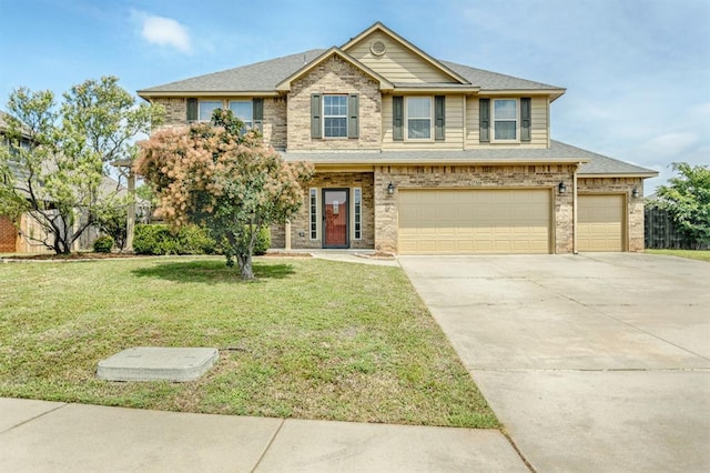 17504 Silverhawk Way, Edmond, OK 73012 - view of front of house featuring driveway, a front yard, brick siding, and an attached garage