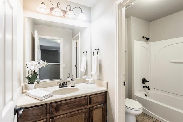 17504 Silverhawk Way, Edmond, OK 73012 - bathroom with vanity, toilet, tub / shower combination, and tile patterned floors