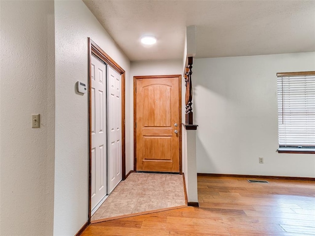 16687 SE 16th St, Choctaw, OK 73020 - entryway featuring light wood-style floors and baseboards