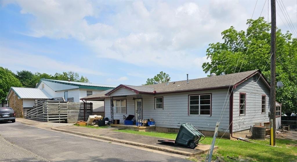 1303 W Muskogee Ave, Sulphur, OK 73086 - view of front of property with central AC unit