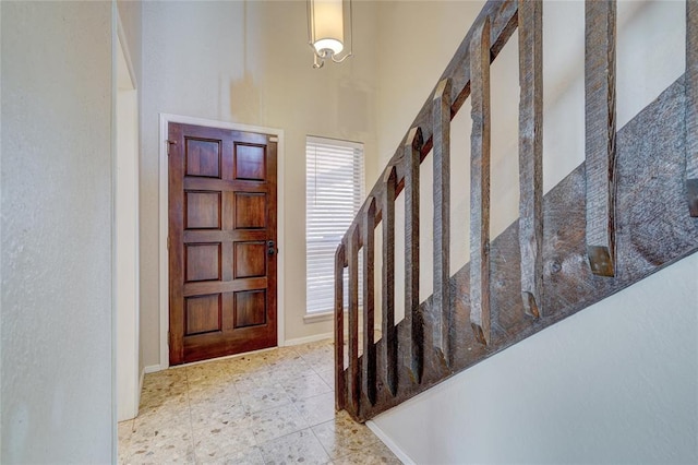 12217 Cork Rd, Oklahoma City, OK 73162 - foyer featuring a towering ceiling and tile patterned floors