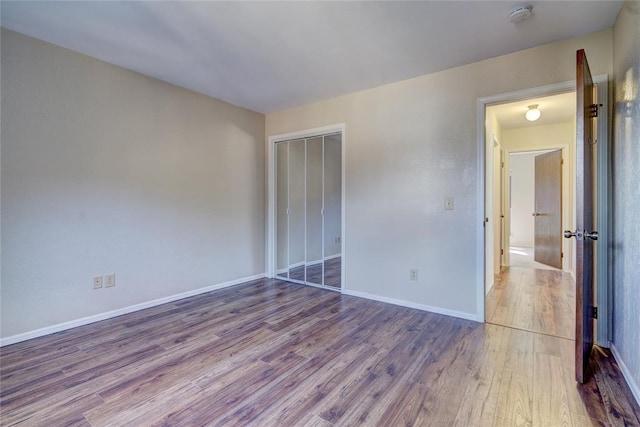 12217 Cork Rd, Oklahoma City, OK 73162 - unfurnished room with a smoke detector and wood finished floors