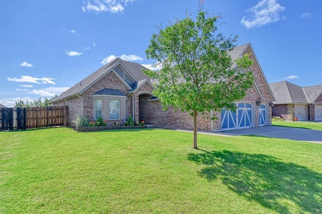 3024 Wakefield Rd, Edmond, OK 73034 - view of front of home featuring concrete driveway, brick siding, and a garage