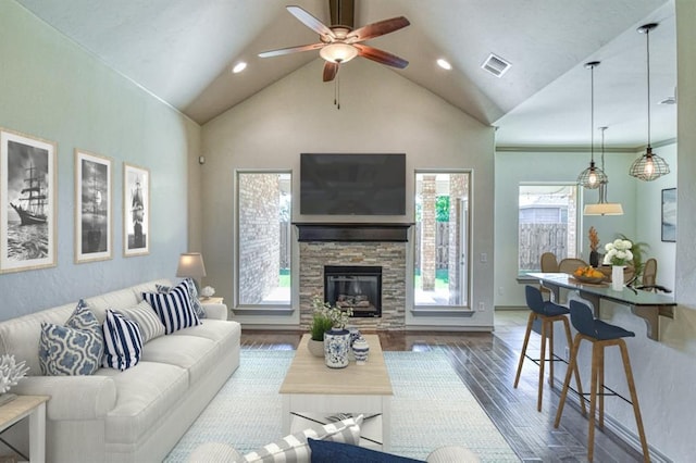 3024 Wakefield Rd, Edmond, OK 73034 - living room featuring ceiling fan, lofted ceiling, wood finished floors, a fireplace, and recessed lighting