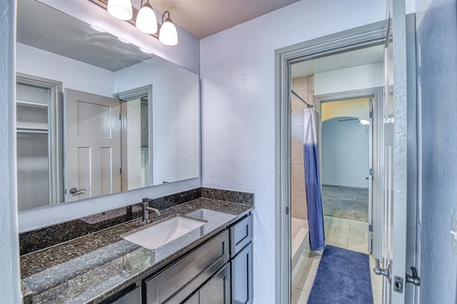 3024 Wakefield Rd, Edmond, OK 73034 - full bath featuring vanity, tile patterned floors, and shower / bath combo