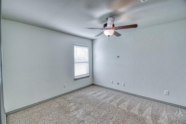 3024 Wakefield Rd, Edmond, OK 73034 - carpeted spare room featuring ceiling fan and baseboards