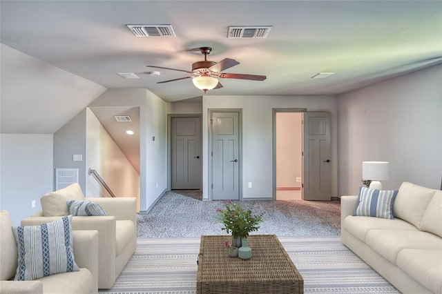 3024 Wakefield Rd, Edmond, OK 73034 - carpeted living room with ceiling fan and vaulted ceiling