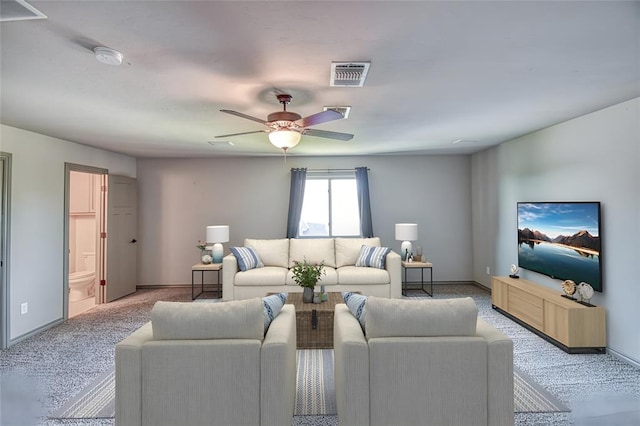 3024 Wakefield Rd, Edmond, OK 73034 - living room featuring light carpet and a ceiling fan