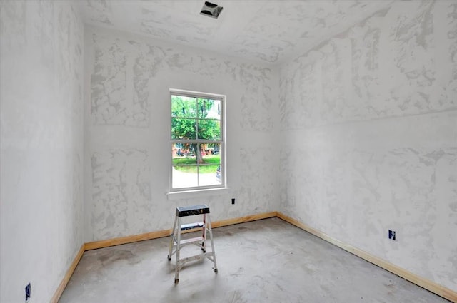 2807 N Lyon Dr, Oklahoma City, OK 73107 - spare room with unfinished concrete flooring and baseboards