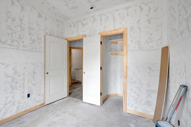 2807 N Lyon Dr, Oklahoma City, OK 73107 - unfurnished bedroom featuring concrete floors