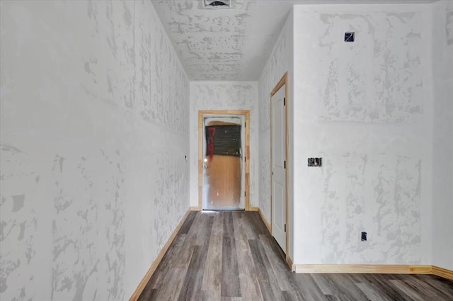 2807 N Lyon Dr, Oklahoma City, OK 73107 - corridor featuring dark wood-style flooring and baseboards