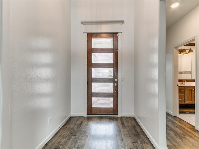 8525 Maple Creek Rd, Arcadia, OK 73007 - foyer entrance featuring dark wood finished floors and baseboards
