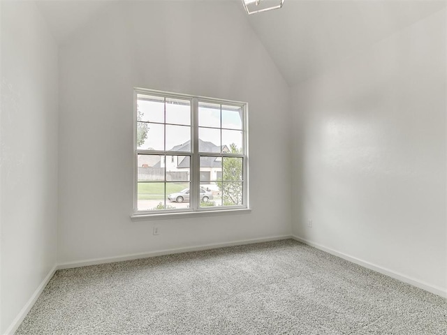 8525 Maple Creek Rd, Arcadia, OK 73007 - carpeted spare room featuring vaulted ceiling and baseboards