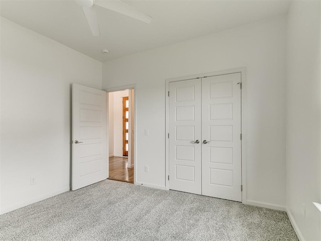 8525 Maple Creek Rd, Arcadia, OK 73007 - unfurnished bedroom featuring carpet, a closet, baseboards, and ceiling fan