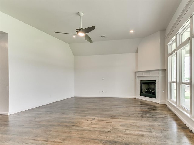 8525 Maple Creek Rd, Arcadia, OK 73007 - unfurnished living room with lofted ceiling, a high end fireplace, a ceiling fan, wood finished floors, and baseboards