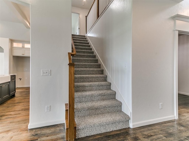 8525 Maple Creek Rd, Arcadia, OK 73007 - staircase with wood finished floors, arched walkways, and baseboards