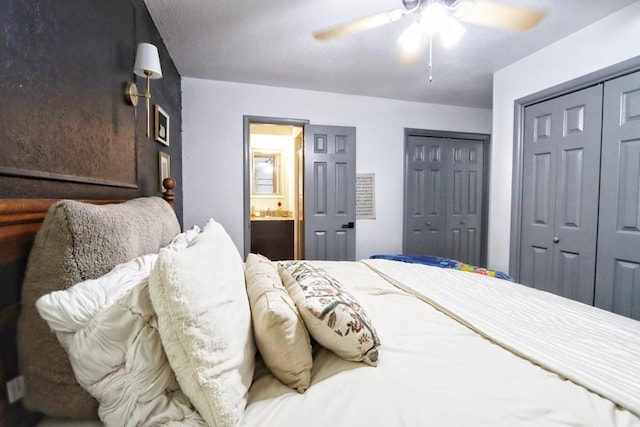5704 N Warren Ave, Oklahoma City, OK 73112 - bedroom with a ceiling fan, two closets, and ensuite bathroom