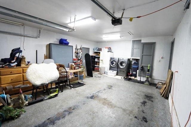 5704 N Warren Ave, Oklahoma City, OK 73112 - garage with washing machine and clothes dryer and a garage door opener