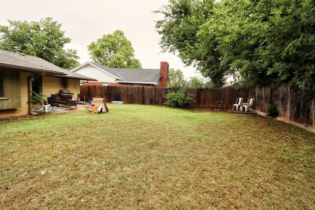 5704 N Warren Ave, Oklahoma City, OK 73112 - view of yard featuring a patio area