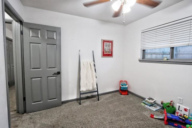 5704 N Warren Ave, Oklahoma City, OK 73112 - playroom featuring ceiling fan and carpet flooring