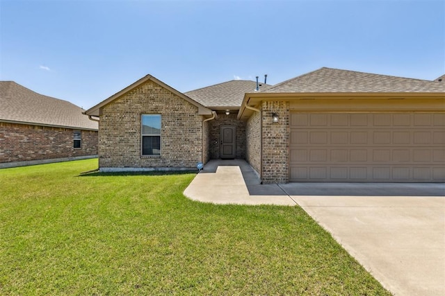 1012 SW 13th St, Moore, OK 73160 - ranch-style home with brick siding, a front yard, roof with shingles, driveway, and a garage