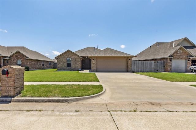 1012 SW 13th St, Moore, OK 73160 - view of front of property with an attached garage, brick siding, and driveway