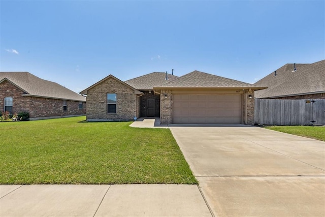 1012 SW 13th St, Moore, OK 73160 - view of front of home featuring brick siding, a garage, concrete driveway, and roof with shingles
