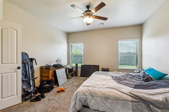 1012 SW 13th St, Moore, OK 73160 - bedroom featuring carpet and a ceiling fan