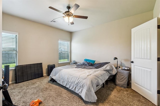 1012 SW 13th St, Moore, OK 73160 - bedroom featuring carpet flooring, a ceiling fan, and baseboards