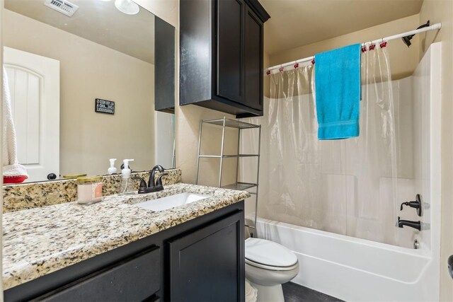 1012 SW 13th St, Moore, OK 73160 - bathroom featuring toilet, vanity, and shower / tub combo with curtain