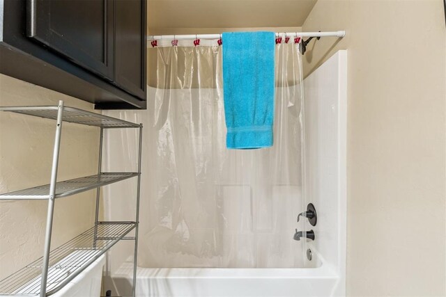 1012 SW 13th St, Moore, OK 73160 - bathroom with shower / bathtub combination with curtain
