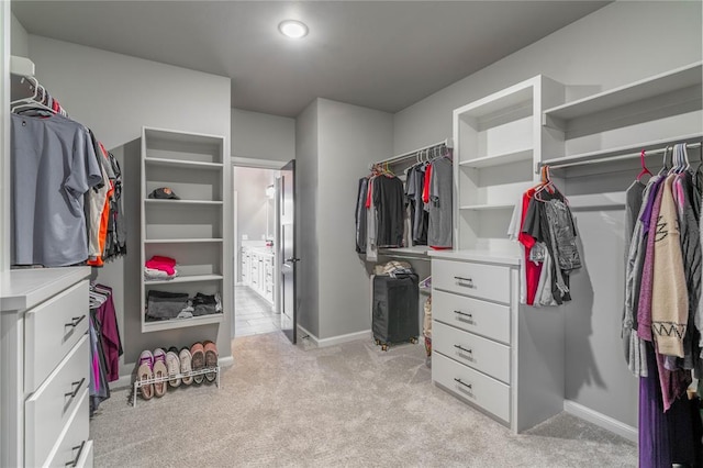 5808 Ledgestone Dr, Mustang, OK 73064 - walk in closet with light carpet