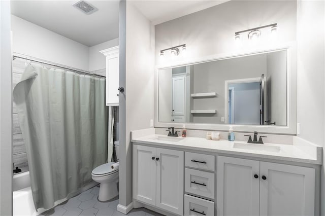 5808 Ledgestone Dr, Mustang, OK 73064 - bathroom with toilet, double vanity, shower / bath combo, and tile patterned flooring