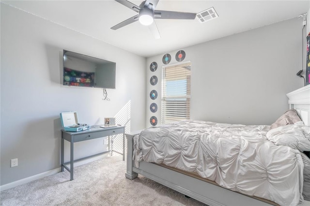 5808 Ledgestone Dr, Mustang, OK 73064 - carpeted bedroom with baseboards and ceiling fan