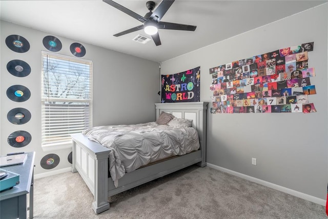 5808 Ledgestone Dr, Mustang, OK 73064 - carpeted bedroom featuring baseboards and a ceiling fan