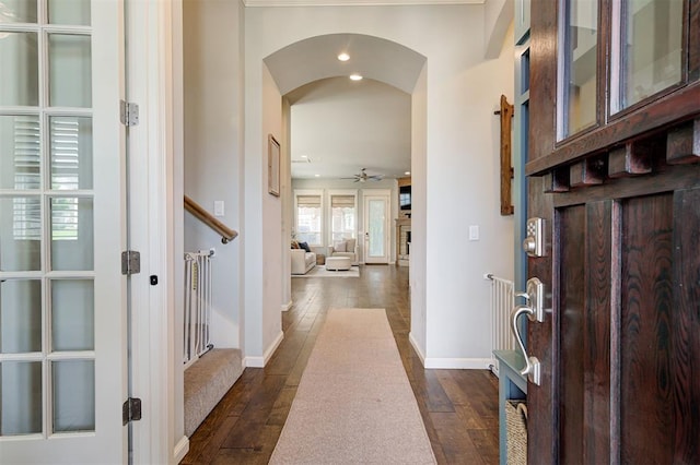 1508 Station St, Edmond, OK 73034 - entryway featuring arched walkways, dark wood-style flooring, a ceiling fan, and recessed lighting