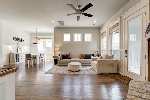 1508 Station St, Edmond, OK 73034 - living area featuring dark wood-type flooring, a ceiling fan, and recessed lighting