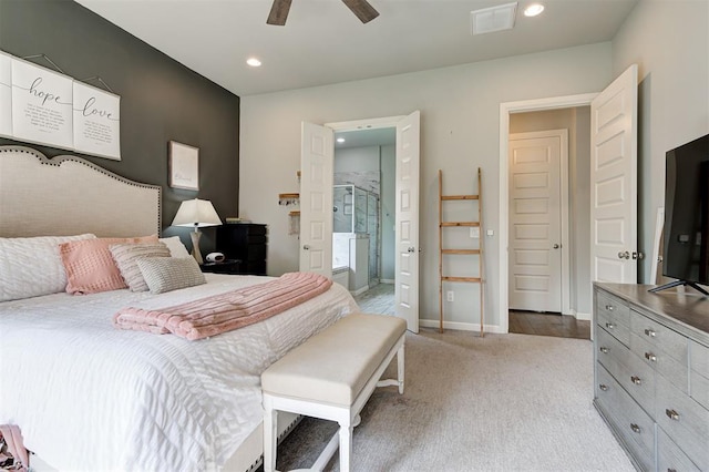 1508 Station St, Edmond, OK 73034 - bedroom with carpet floors, recessed lighting, connected bathroom, and ceiling fan