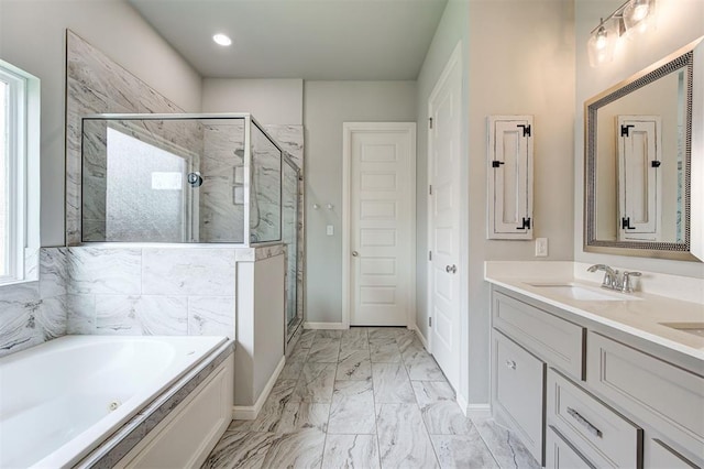 1508 Station St, Edmond, OK 73034 - bathroom featuring a stall shower, a tub with jets, marble look tile flooring, double vanity, and recessed lighting