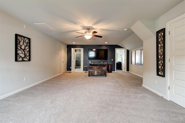 1508 Station St, Edmond, OK 73034 - carpeted living room with a ceiling fan and lofted ceiling