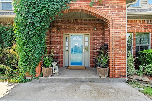 16350 SW 15th St, Yukon, OK 73099 - entrance to property with brick siding and roof with shingles