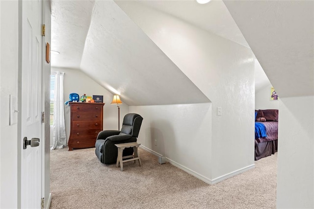 16350 SW 15th St, Yukon, OK 73099 - sitting room featuring carpet flooring, vaulted ceiling, and baseboards
