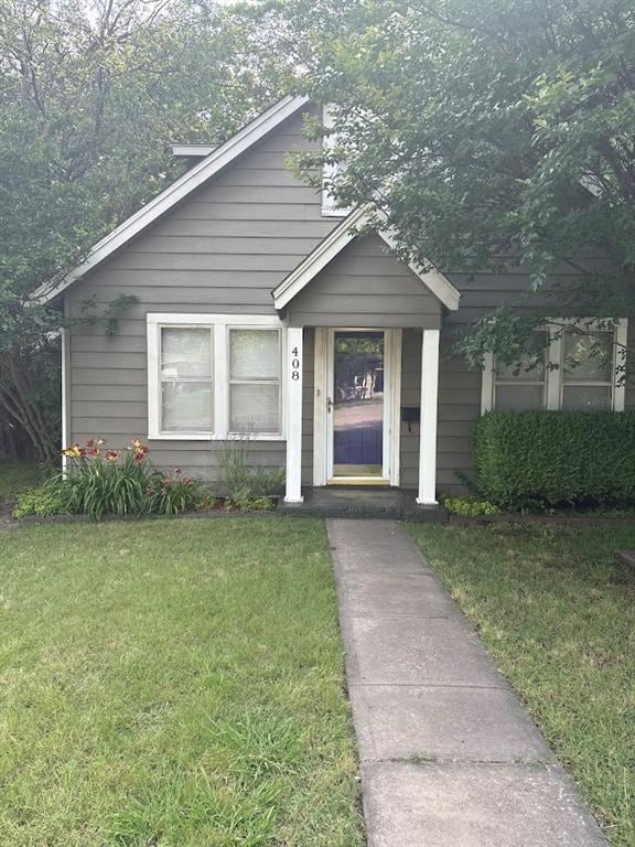 408 N Findlay St, Norman, OK 73071 - bungalow featuring a front yard